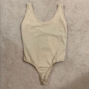 Low back cut tan body suit!